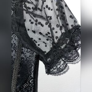 EUC Black corset with tulle puff sleeves. Size M